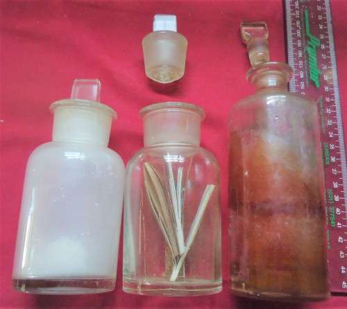 THREE DIFFERENT SIZE CLEAR GLASS VINTAGE CHEMIST-APOTHECARY BOTTLES WITH GLASS STOPPERS -SEE PHOTOS