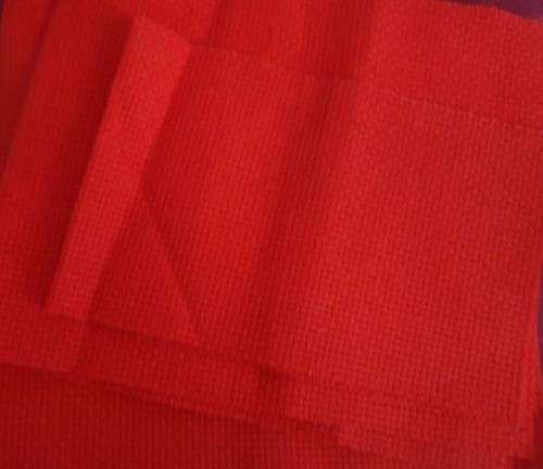 THREE SMALL PIECES OF RED COUNTED WORK FABRIC - SEE LISTING FOR SIZES