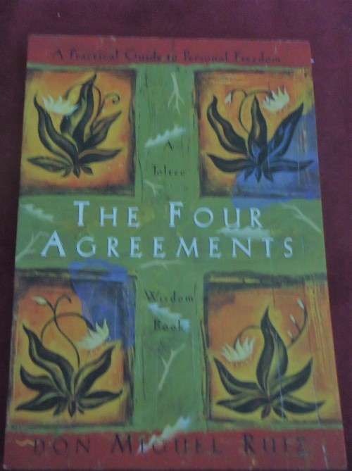 "THE FOUR AGREEMENTS - A TOLTEC WISDOM BOOK"  - DON MIGUEL RUIZ - SMALL SOFT COVER