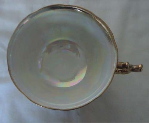 OPALESQUE ROMANTIC SCENE IN BURGUNDY WITH GILT FOOTED CUP & LATTICE WORK SAUCER DUO