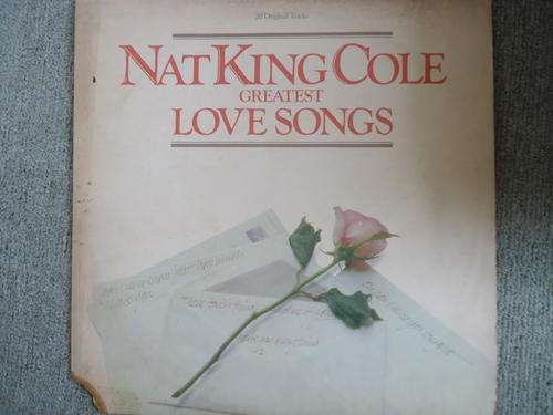 NAT KING COLE - "NAT KING COLE GREATEST LOVE SONGS" STEREO LP WITH WEAR ON THE COVER