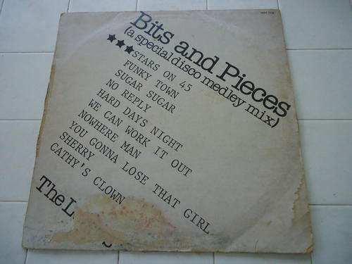 "BITS AND PIECES"  A SPECIAL DISCO MEDLEY MIX - 1981 STEREO LP WITH THE COVER SHOWING STAIN MARKS
