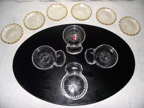 FOUR FOSTORIA CRYSTAL COASTERS AND SIX SHELL COASTERS