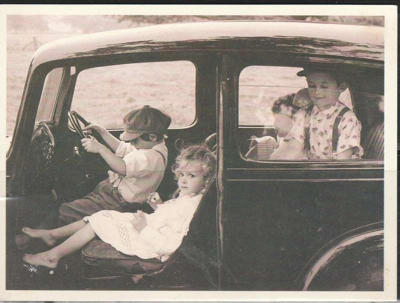 PHOTO POST CARD SHOWING CHILDREN IN AN OLD CAR MINT LOOK SCAN