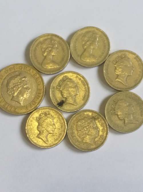 SELECTION OF BRITISH POUND COINS . SOME RARE .