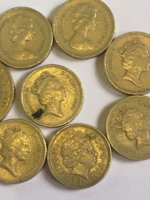 SELECTION OF BRITISH POUND COINS . SOME RARE .