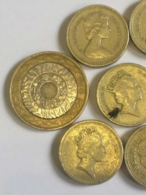SELECTION OF BRITISH POUND COINS . SOME RARE .