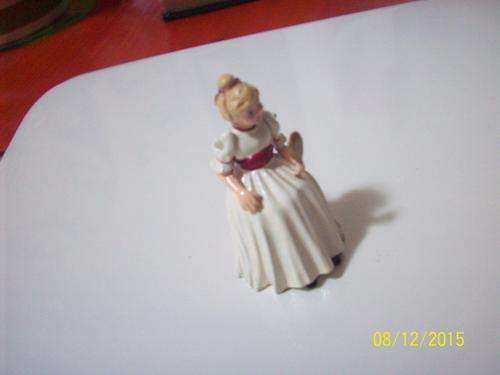Very Unusual metal thimble featuring little lady