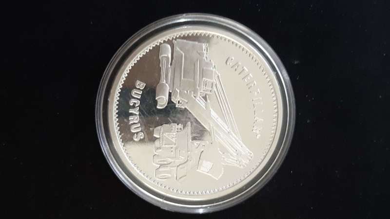 2011 CATERPILLAR BUCYRUS MERGER COMMEMORATIVE COIN ENCAPSULATED