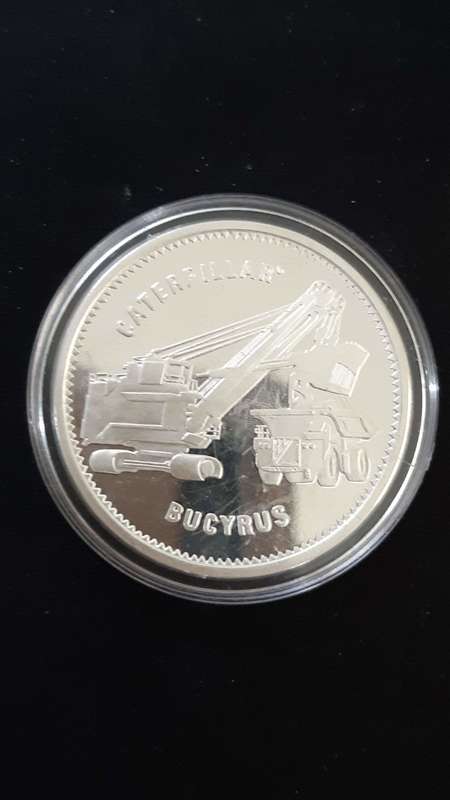 2011 CATERPILLAR BUCYRUS MERGER COMMEMORATIVE COIN ENCAPSULATED