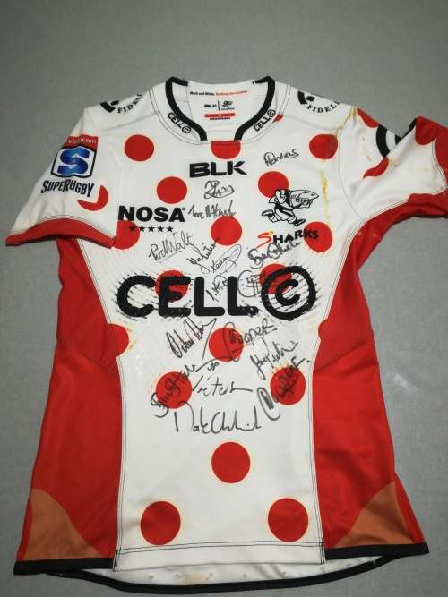Sharks Training Jersey Signed, previously framed with some glue marks.