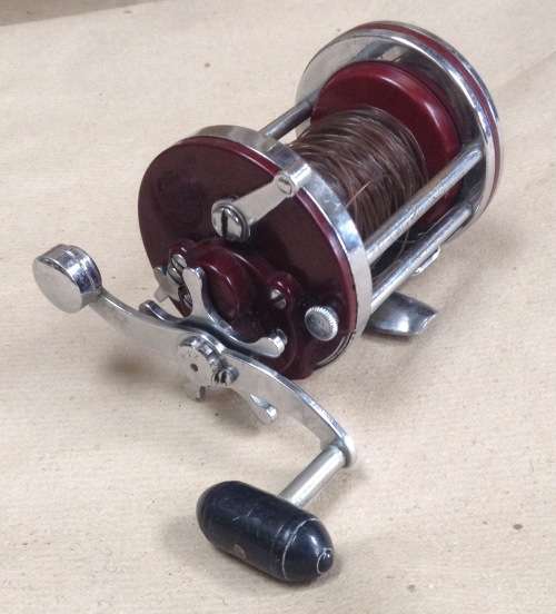 Penn Squidder 140.....functions well.....you'll cast a smile.