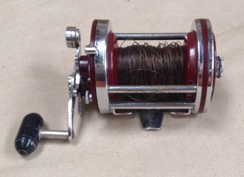 Penn Squidder 140.....functions well.....you'll cast a smile.