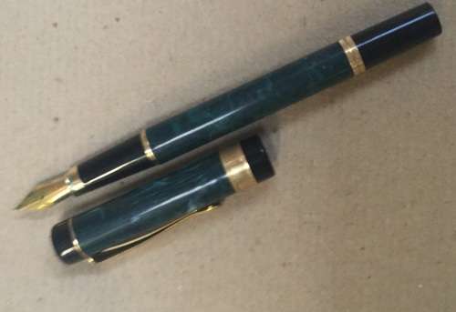 Fountain pen marked on nib " Iridium Point Germany" .