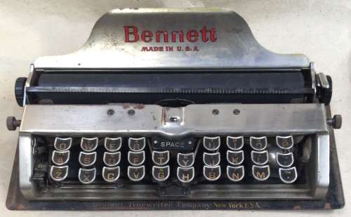 Bennett....the smallest typewriter ever....and with qwerty keyboard....circa 1910