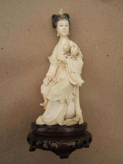 Ivory Figurine....200mm high incl silver wire inlaid stand....postage R1050.00