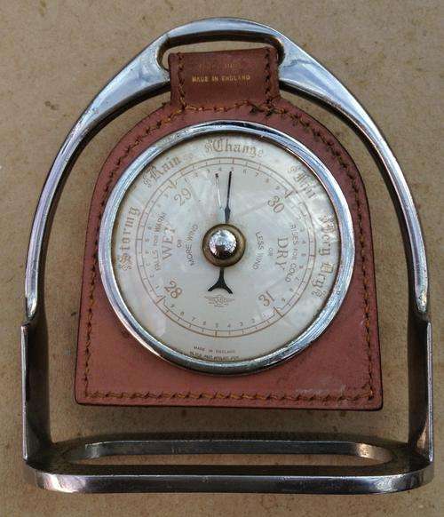 Stirrup Frame Barometer.....Made in England......leather holder......and works