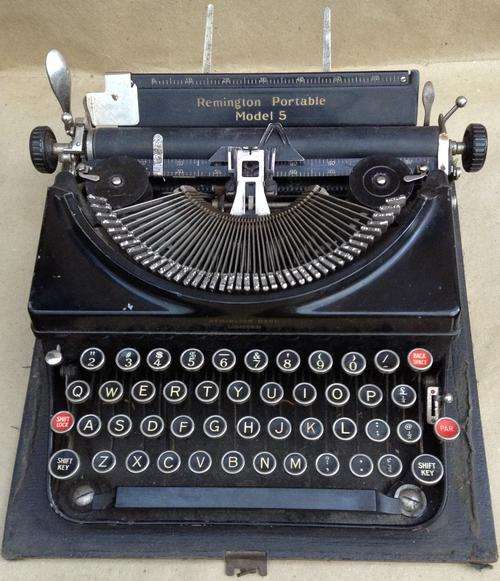 Portable Model 5....all there, keys work with super sound, needs service....postage R60.00