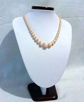 AN OLD NECKLACE