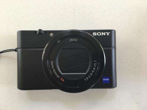 Sony Cyber-shot DSC-RX100 III Digital Camera + Leather Case + 64GB SD Card