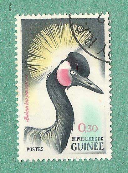Guinea Stamp. Sold as is.