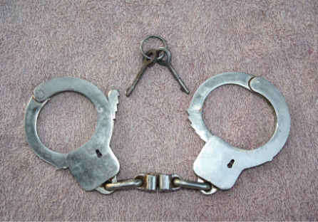 Pair of old SAP Hand Cuffs with two keys in working condition