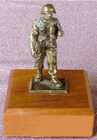 Small Troepie Statuette on Wood Base