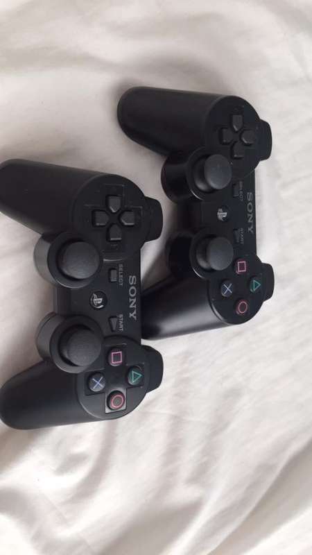2 PS3 Dual Shock controllers