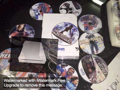 Wii console and 20 games ***Collection allowed***