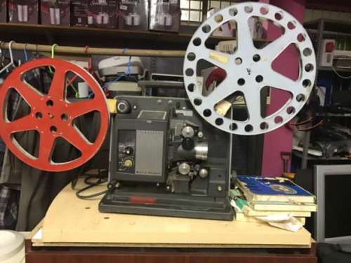 Bell & Howell Filmosound Vintage Projector With Reels, Films and Speaker Box