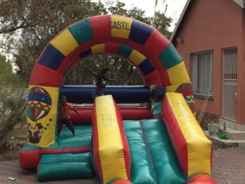 4m x 4m Rainbow Jumping Castle with 5m slide *Valued at R15,000*