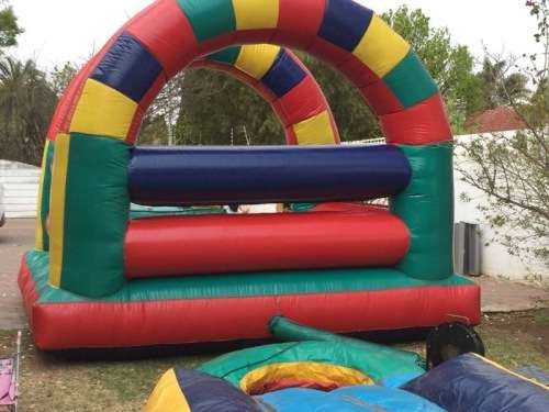 4m x 4m Rainbow Jumping Castle with 5m slide *Valued at R15,000*