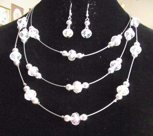 GORGEOUS CLEAR FACETED CRYSTAL AND SILVER FLOATING BEADS NECKLACE & EARRINGS SET