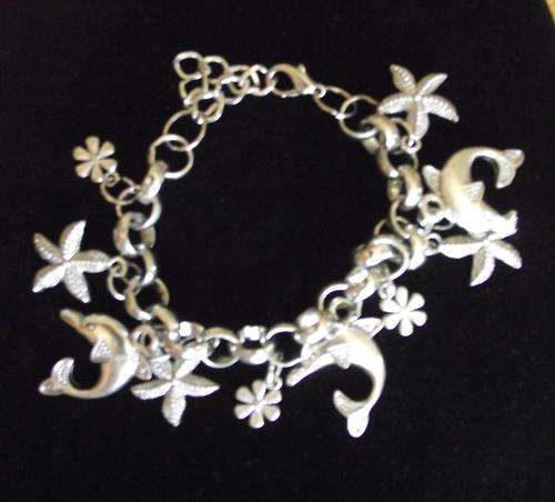 Gorgeous Tibetan Silver Dolphin, Flower & Seastar Charm Bracelet