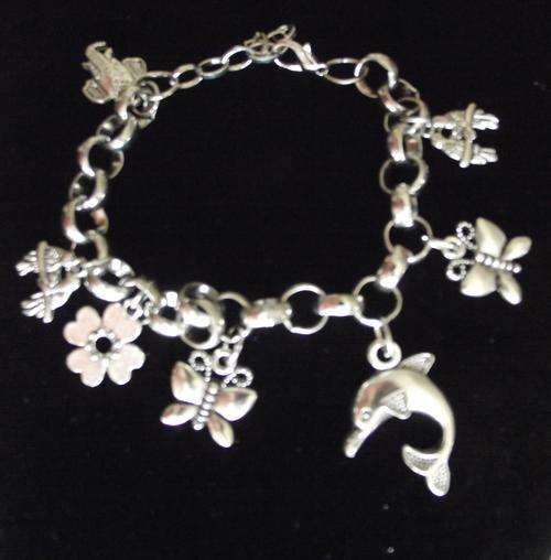 Gorgeous Tibetan Silver Dolphin, Flower, Butterfly Charm Bracelet