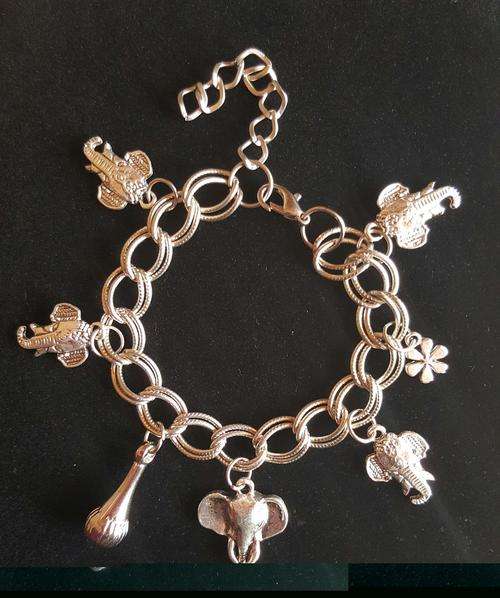 Gorgeous Tibetan Silver Elephant, Flower, Butterfly Charm Bracelet