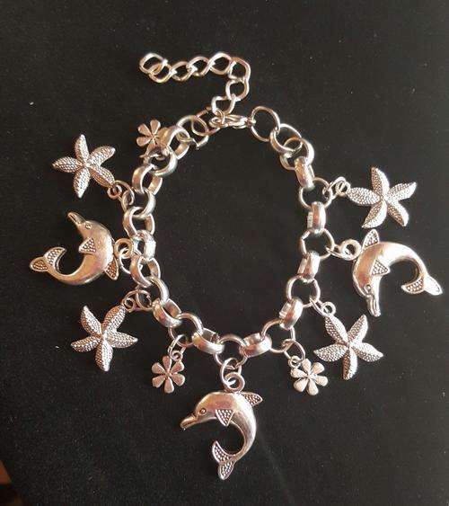 Gorgeous Tibetan Silver Dolphin, Flower & Seastar Charm Bracelet