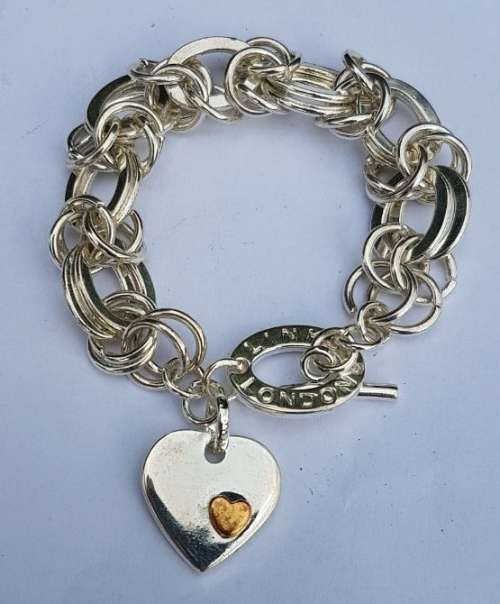 STUNNING  925 SILVER FILLED HEART CHARM BRACELET