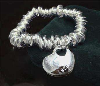 STUNNING STERLING SILVER 100 CIRCLES BRACELET WITH SOLID HEART