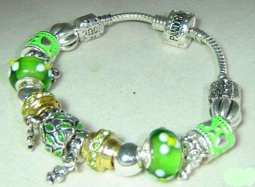 LOVELY STERLING SILVER MULTI CHARM PANDORA BRACELET