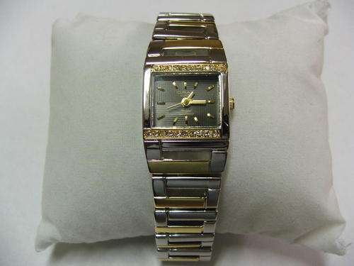 ***VERY PRETTY!!!***SILVER AND GOLD WATCH WITH GENUINE CRYSTALS FROM THE OMAX COLLECTION!!