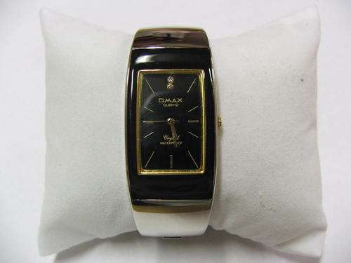 ***GORGEOUS!!!***SILVER BANGLE WATCH WITH GENUINE CRYSTALS FROM THE OMAX COLLECTION!!!