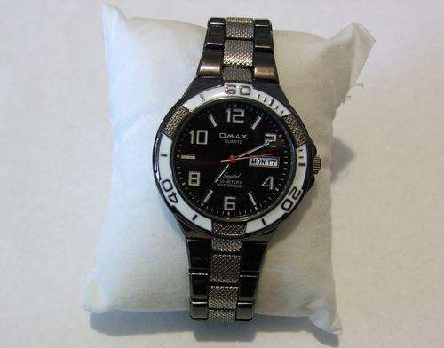 ***MAGNIFICENT!!!***SWISS DESIGNED OMAX SILVER AND GUN SMOKE WATCH!!!