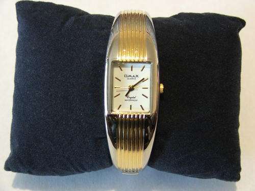 ****VERY ELEGANT!!!***SILVER AND GOLD BANGLE WATCH FROM THE OMAX COLLECTION!!!