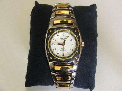 ***STRIKINGLY DIFFERENT!!!***SILVER AND GOLD WATCH FROM THE OMAX COLLECTION!!!