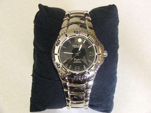 ***COOL AND FUNKY!!!***SILVER WATCH FROM THE OMAX COLLECTION!!!