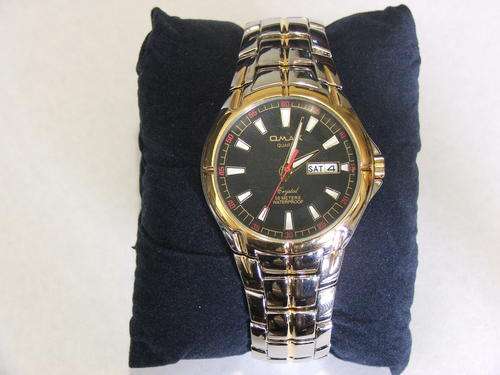 ***SOLID AND MACHO!!!***SILVER AND GOLD WATCH FROM THE OMAX COLLECTION!!!