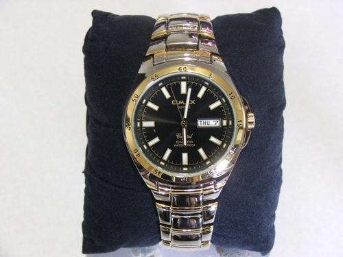 ***VERY MANLY!!!***SILVER AND GOLD WATCH FROM THE OMAX COLLECTION!!