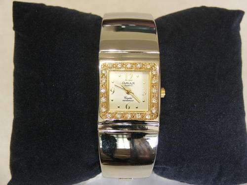 ***GORGEOUS!!!***SILVER AND GOLD BANGLE WATCH WITH GENUINE CRYSTALS FROM THE OMAX COLLECTION!!!