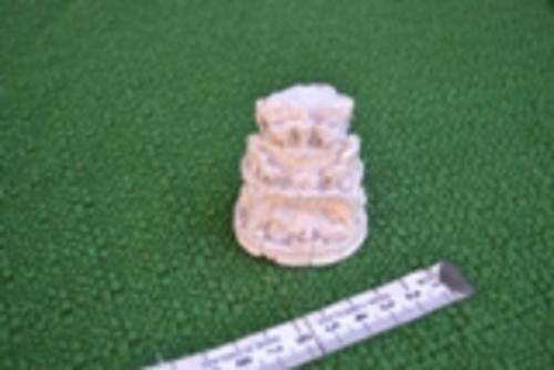 TINY HAND CARVED ORNAMENT